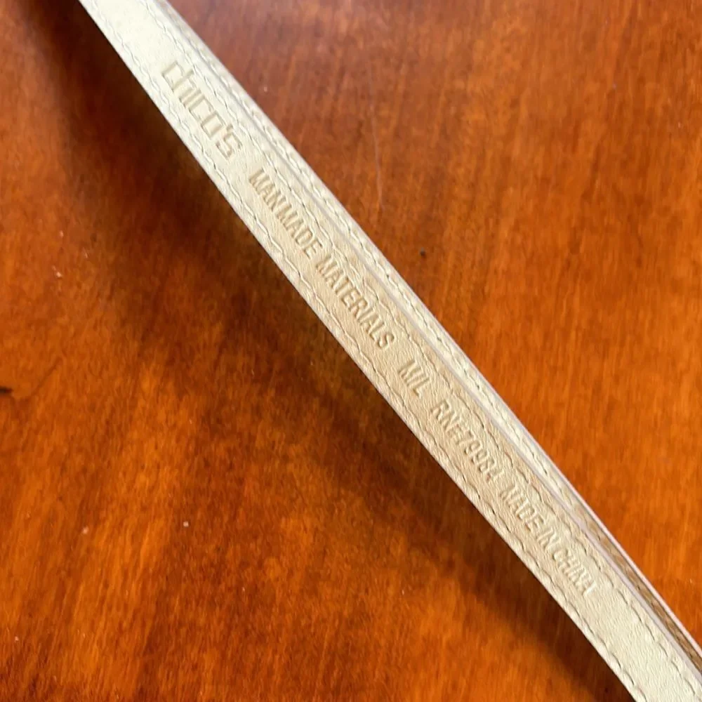 NEW. Chico's Vegan Adjustable Belt in Silver - M/L